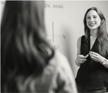 teachers at a white board