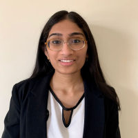 Headshot of 2020-21 Cutler-Bell Prize winner Sahithi Ankireddy. She is a young woman with round glasses, long, straight black hair, medium brown skin and a white blouse.